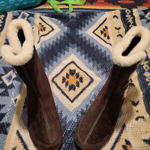 Merrell Water proof Snow/Rain cold weather Boots. Brown with light color trim .